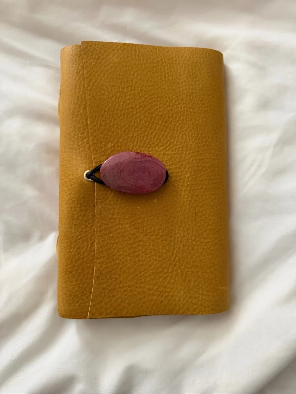 No Boundaries handmade mustard yellow journal with pink stone closure